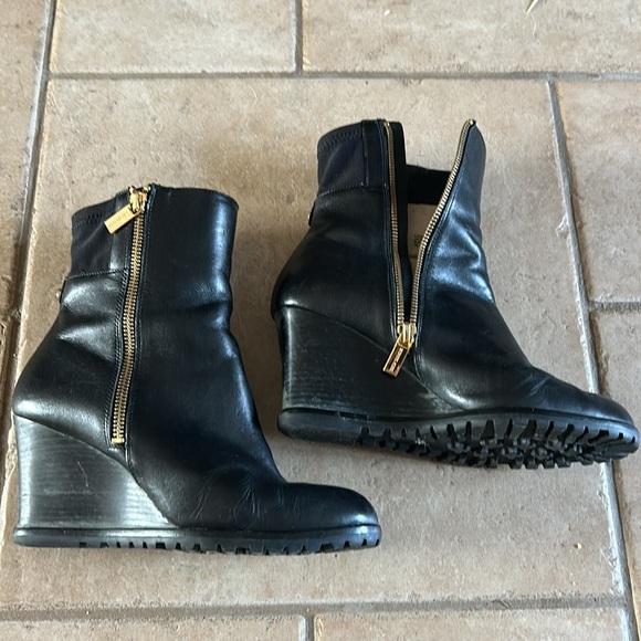 Women’s blackck Michael Kors wedge booties
Size 7M
Like new - Picture 6 of 6